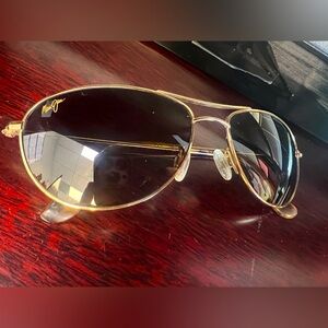 Maui Jim - Baby Beach gold polarized aviator sunglasses with HCL Bronze Lens.